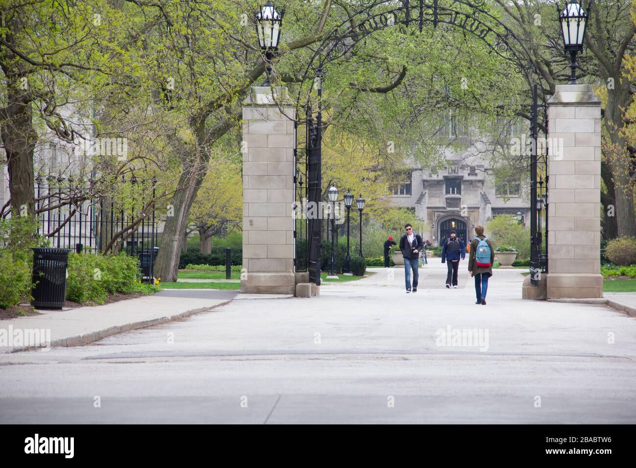 People walking on pedestrian walkway in Hyde Park, Chicago, Illinois