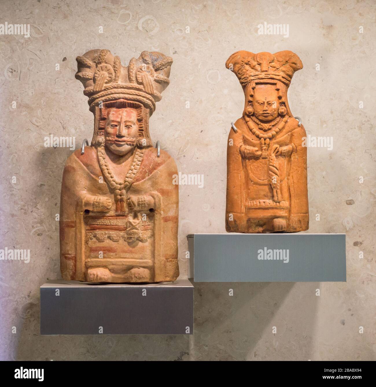 Maya clay figurines in elegant attire exhibited at the Maya Museum, Merida, Yucatan, Mexico. Stock Photo