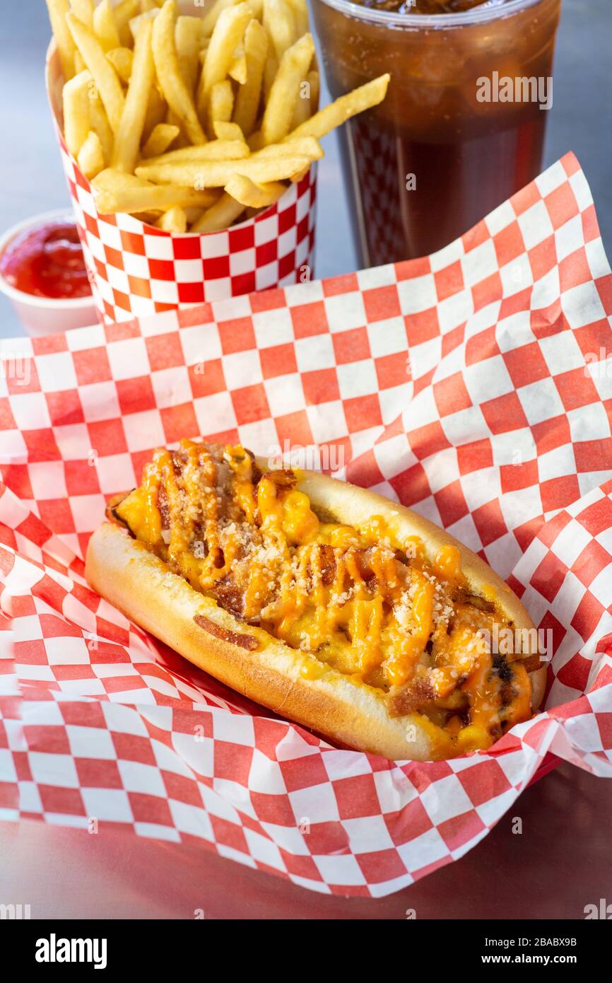 Mac 'n Cheese dog with fries and drink Stock Photo