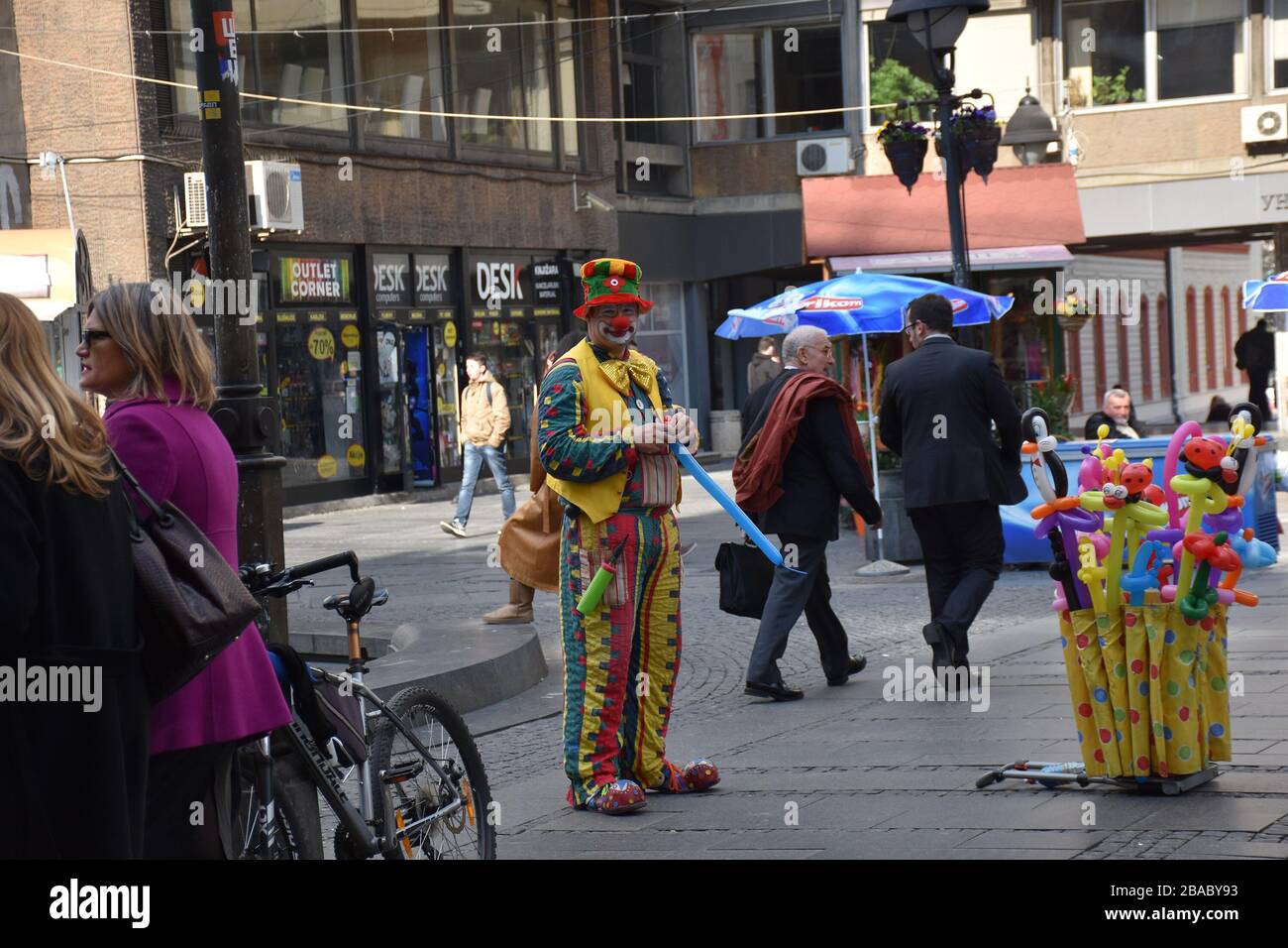 Street clown. A man in a clown suit in Knez Mihailova Street in Belgrade Stock Photo