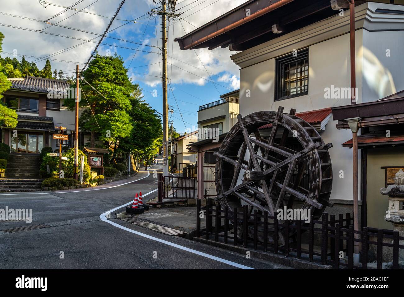 An old watermill in a residential district of Takayama, a charming small city in the hearth of Japan Alps, Gifu prefecture Stock Photo