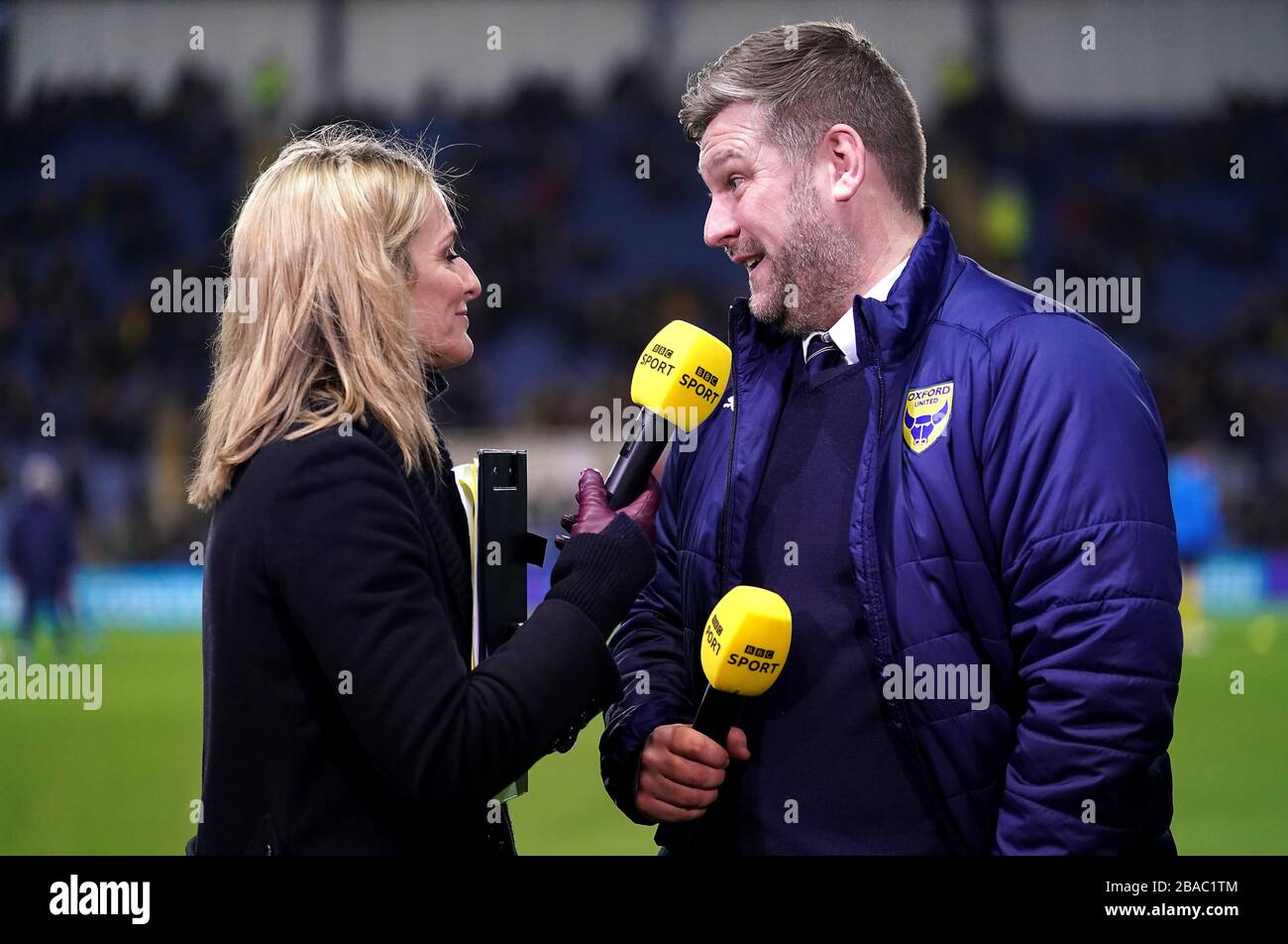 BBC Sport Presenter Gabby Logan (left) interviews Oxford United manager Karl Robinson prior to kick-off Stock Photo