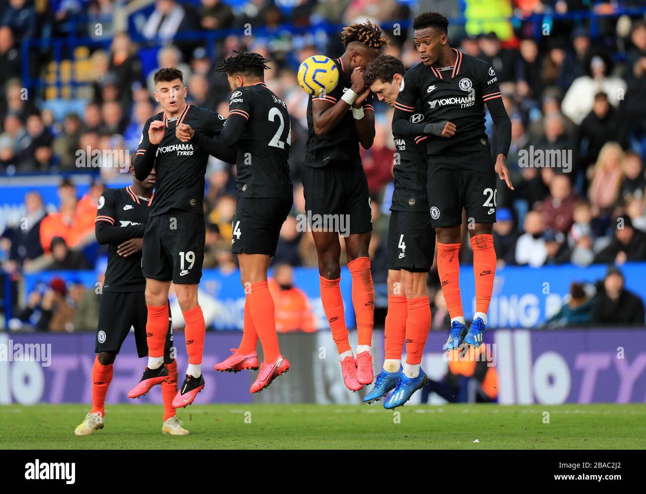Chelsea players block the ball during a free-kick Stock Photo