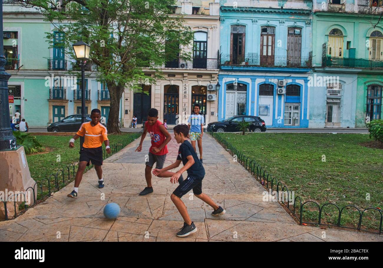 Boys playing football in the park, Habana Vieja, Havana, Cuba Stock Photo