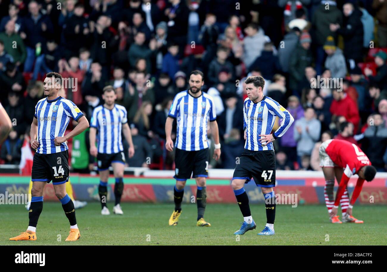 Sheffield Wednesday's players appear dejected after the 1-1 draw Stock Photo