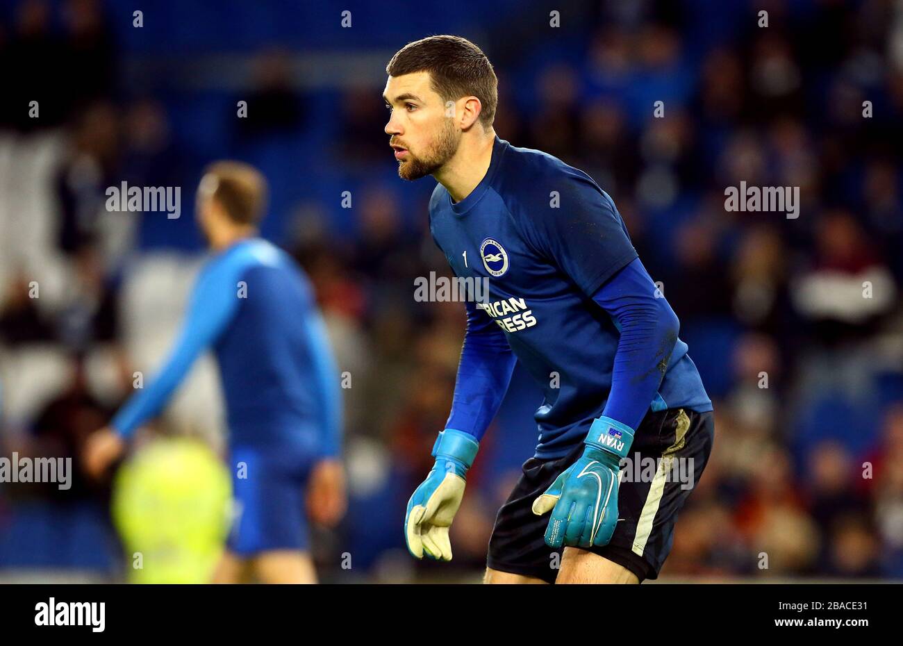Brighton and Hove Albion goalkeeper Mathew Ryan warms up before the match Stock Photo