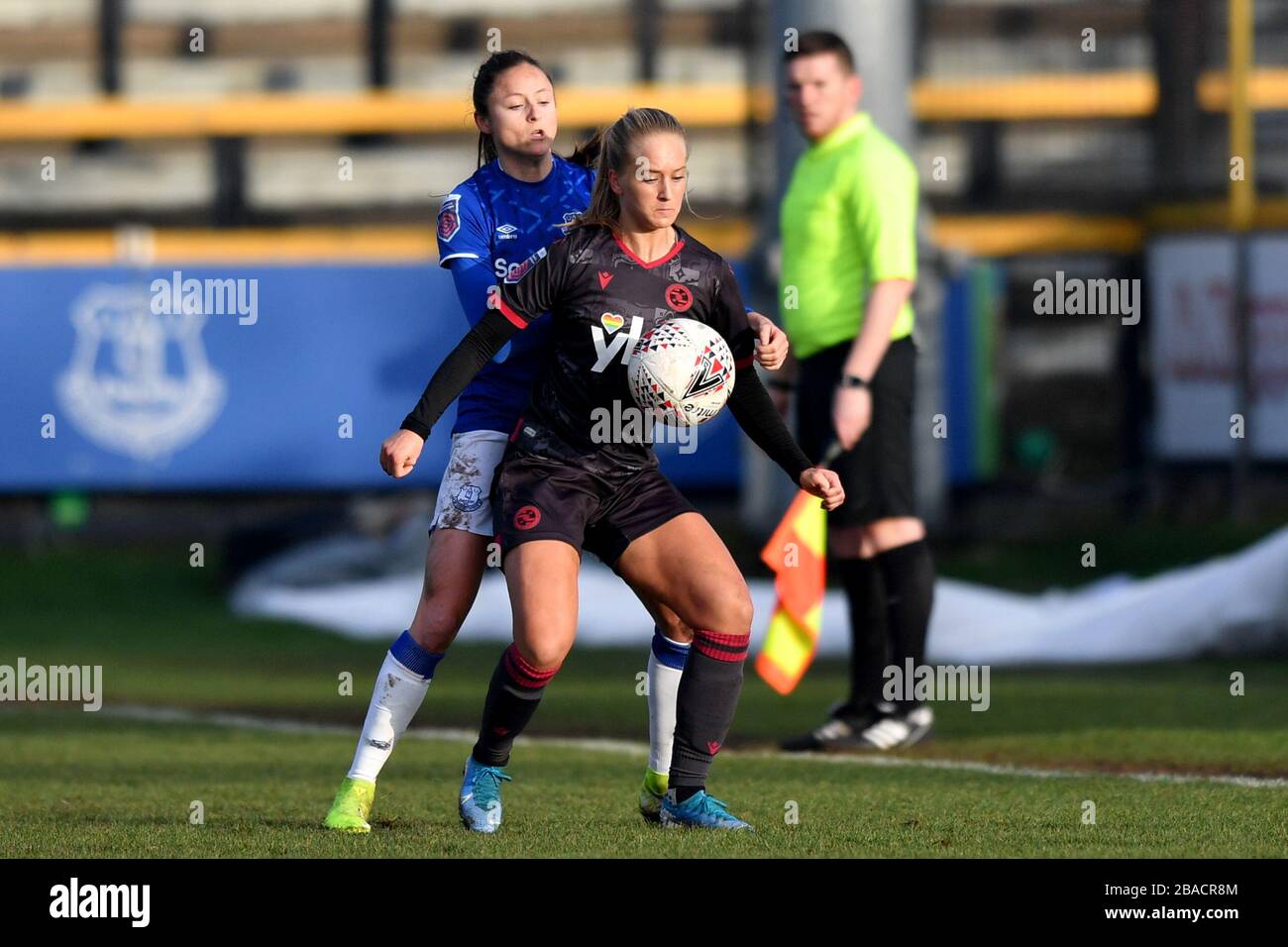 Everton's Danielle Turner and Reading's Amalie Eikeland compete for possession Stock Photo