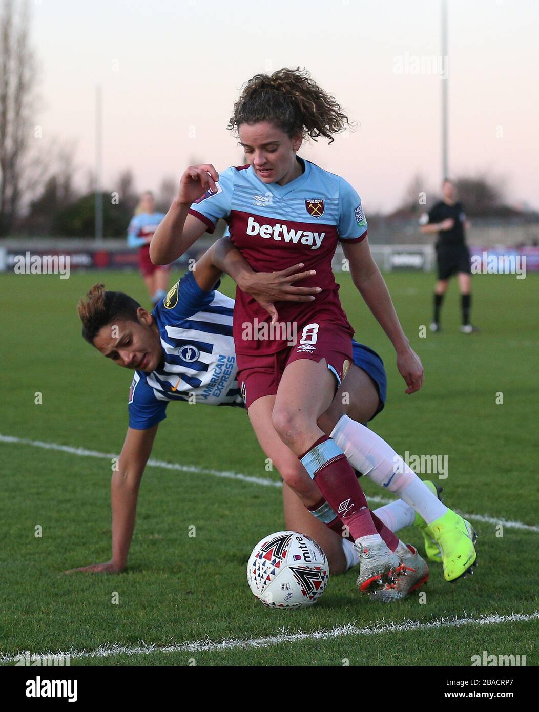 West Ham United's Leanne Kiernan (right) and Brighton and Hove Albion's Victoria Williams battle for the ball Stock Photo