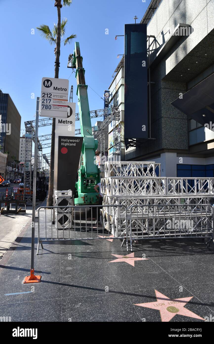 HOLLYWOOD, CA/USA - JANUARY 27, 2020:  A crane installing grandstands and lights for the Oscars on Hollywood Blvd Stock Photo
