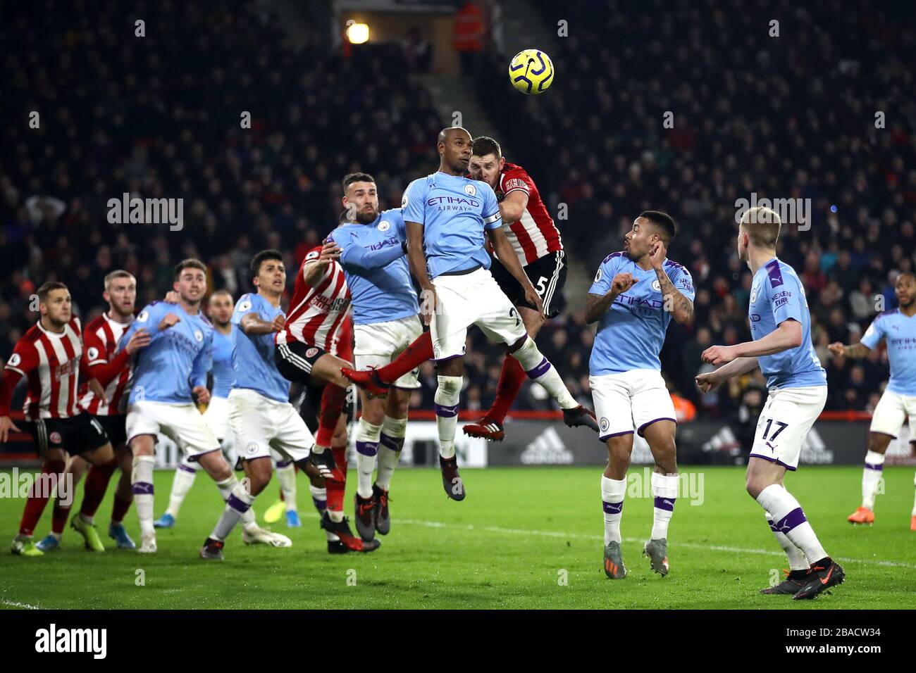 Manchester City's Fernandinho (left) and Sheffield United's Jack O'Connell battle for the ball Stock Photo