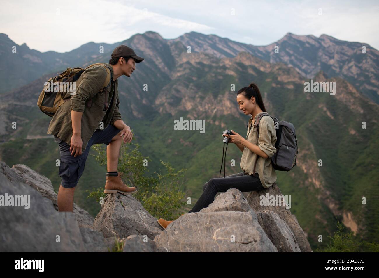 Two women hiking checking hi-res stock photography and images - Alamy
