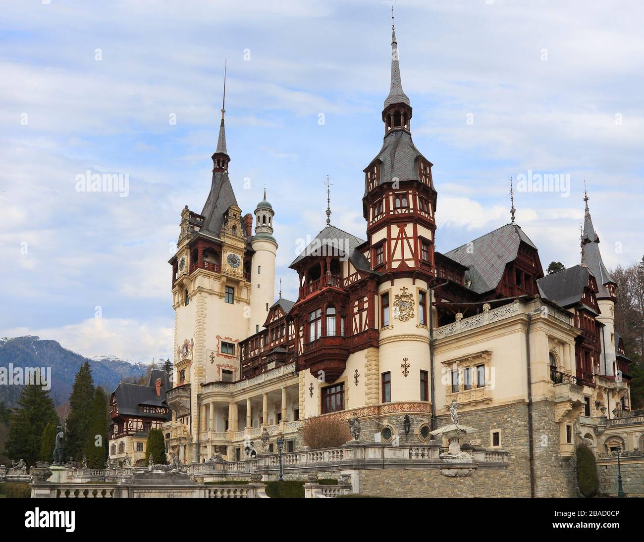 Famous Peles Castle and ornamental garden in Romania, landmark of Carpathian Mountains in Europe Stock Photo