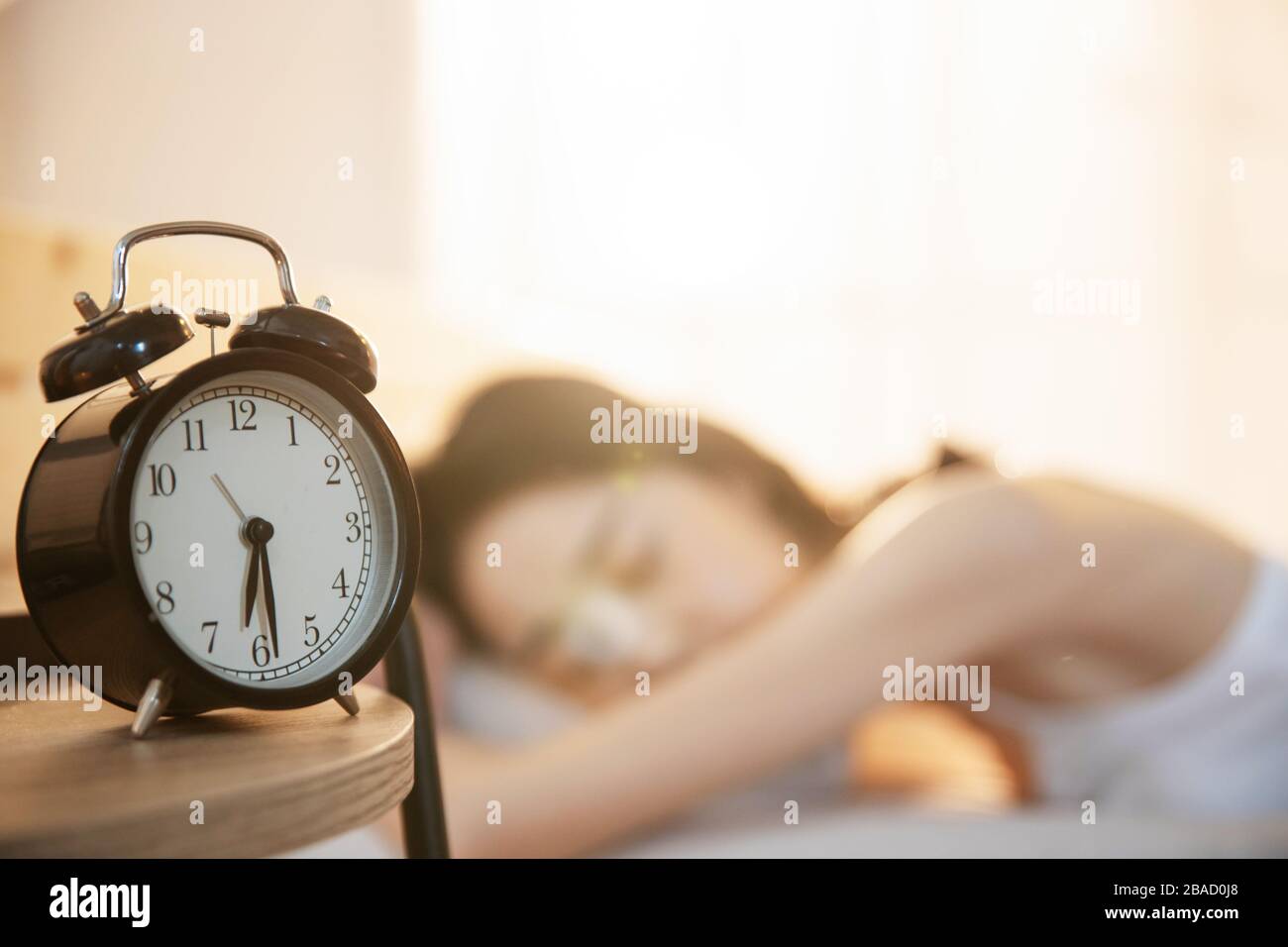 The bedroom nightstand alarm clock Stock Photo Alamy