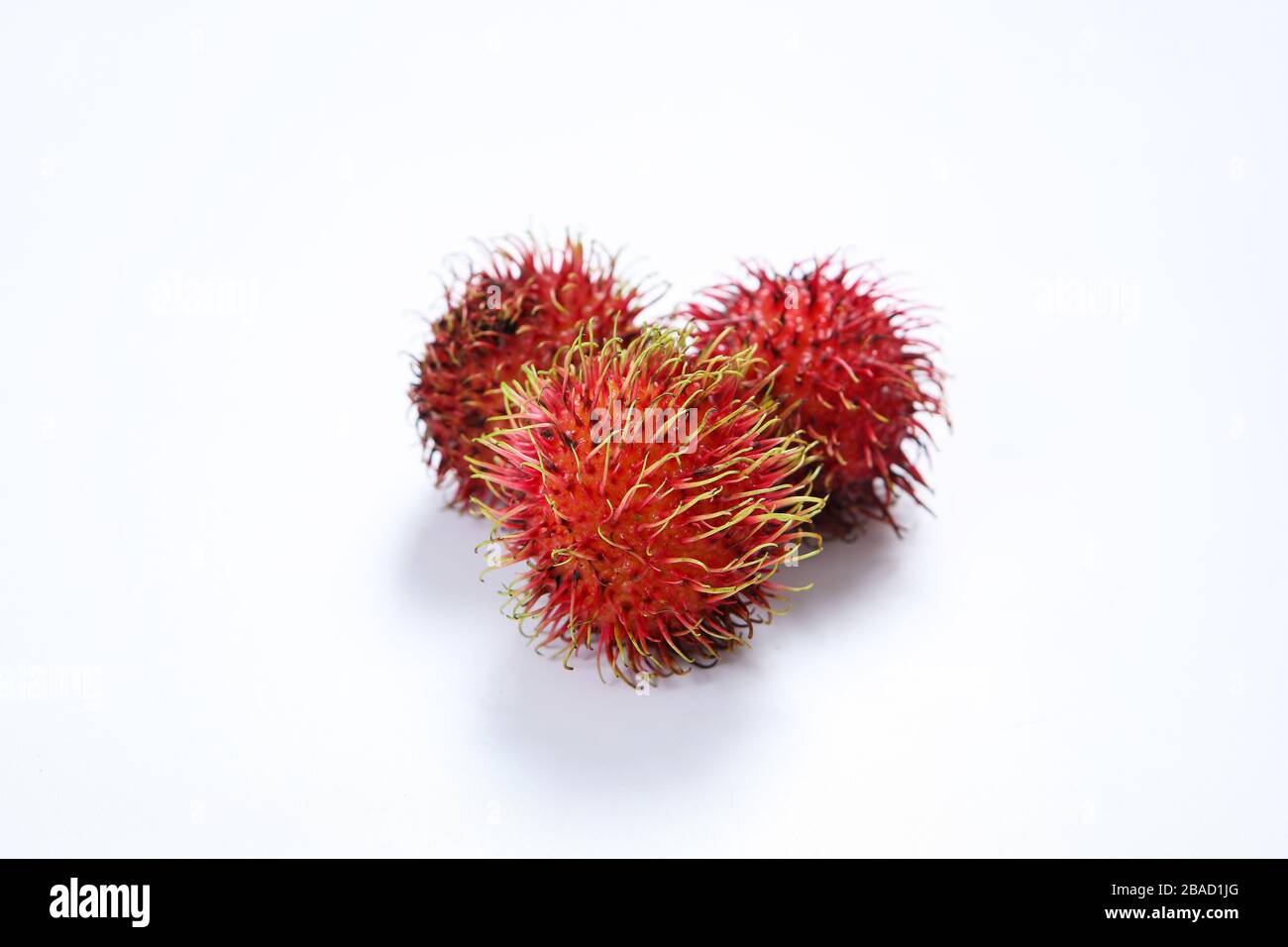 Three tropical fruits, rambutan Stock Photo - Alamy