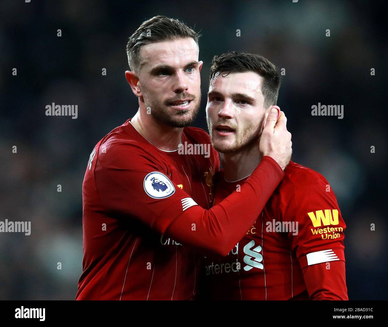 Liverpool S Jordan Henderson Left And Andrew Robertson Celebrate After The Final Whistle Stock Photo Alamy