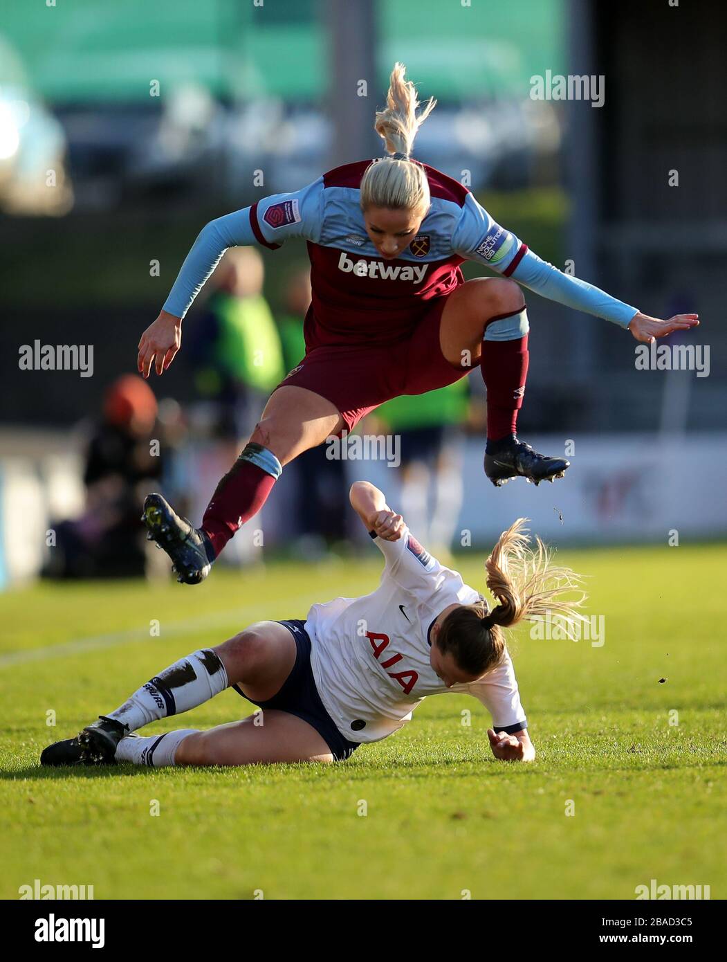 Tottenham Hotspur's Anna Filbey (bottom) and West Ham United’s Adriana ...