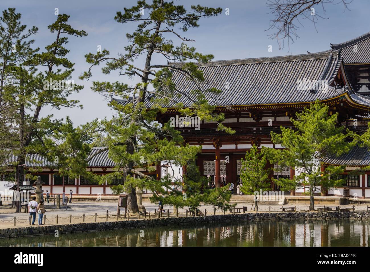 View of Todaiji Temple in Nara, Japan showing few tourists. Taken during downturn in tourism due to the COVID-19 pandemic. Stock Photo