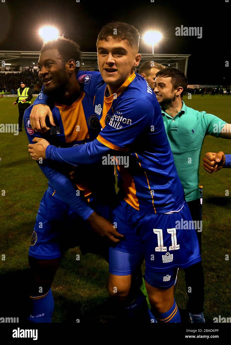 Shrewsbury Town's Aaron Pierre and Ryan Giles (right) celebrate victory after the final whistle Stock Photo