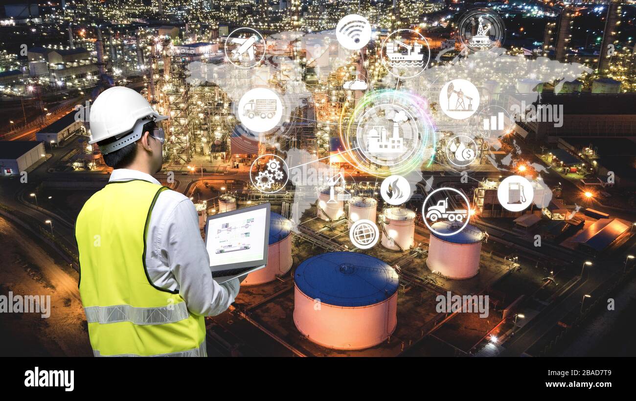 Industry 4.0 of oil and gas refining process of refinery plant, Double exposure of engineer working, Industrial energy system network icons concept. Stock Photo