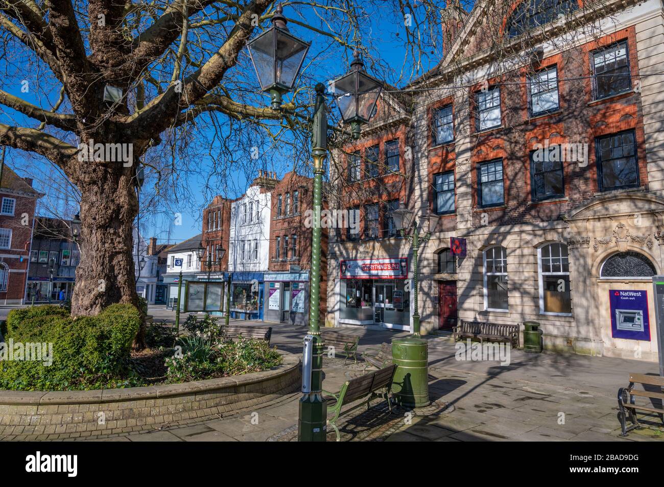 Carfax in Horsham, West Sussex, with NatWest bank and shops in bright morning winter sunshine. Stock Photo