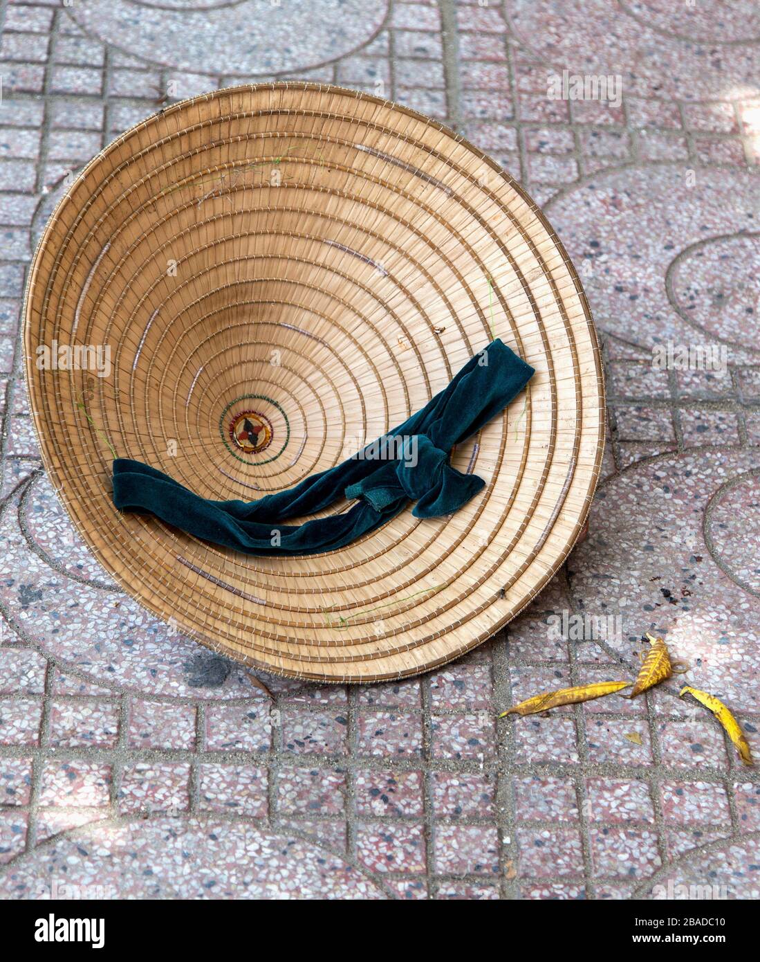 Vietnamese hat on the street. Stock Photo