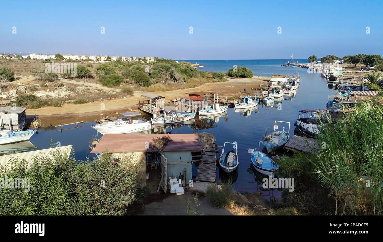 Aerial bird's eye view of Liopetri river to the sea (potamos Liopetriou), Famagusta, Cyprus. A landmark tourist attraction fishing village, natural fj Stock Photo