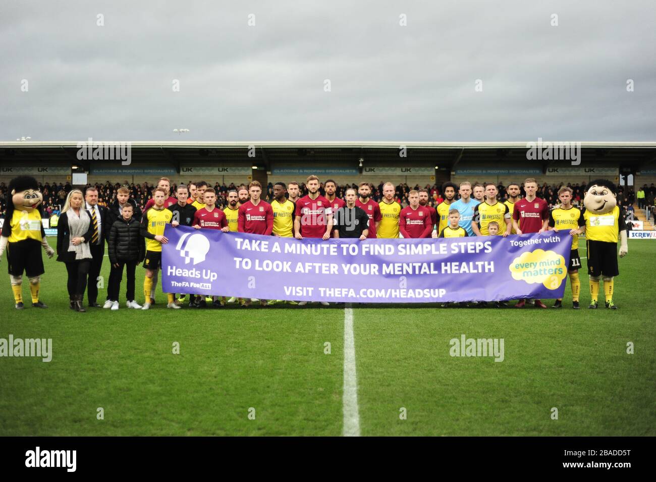 A general view of players holding a mental health awareness banner inside of Pirelli Stadium Stock Photo