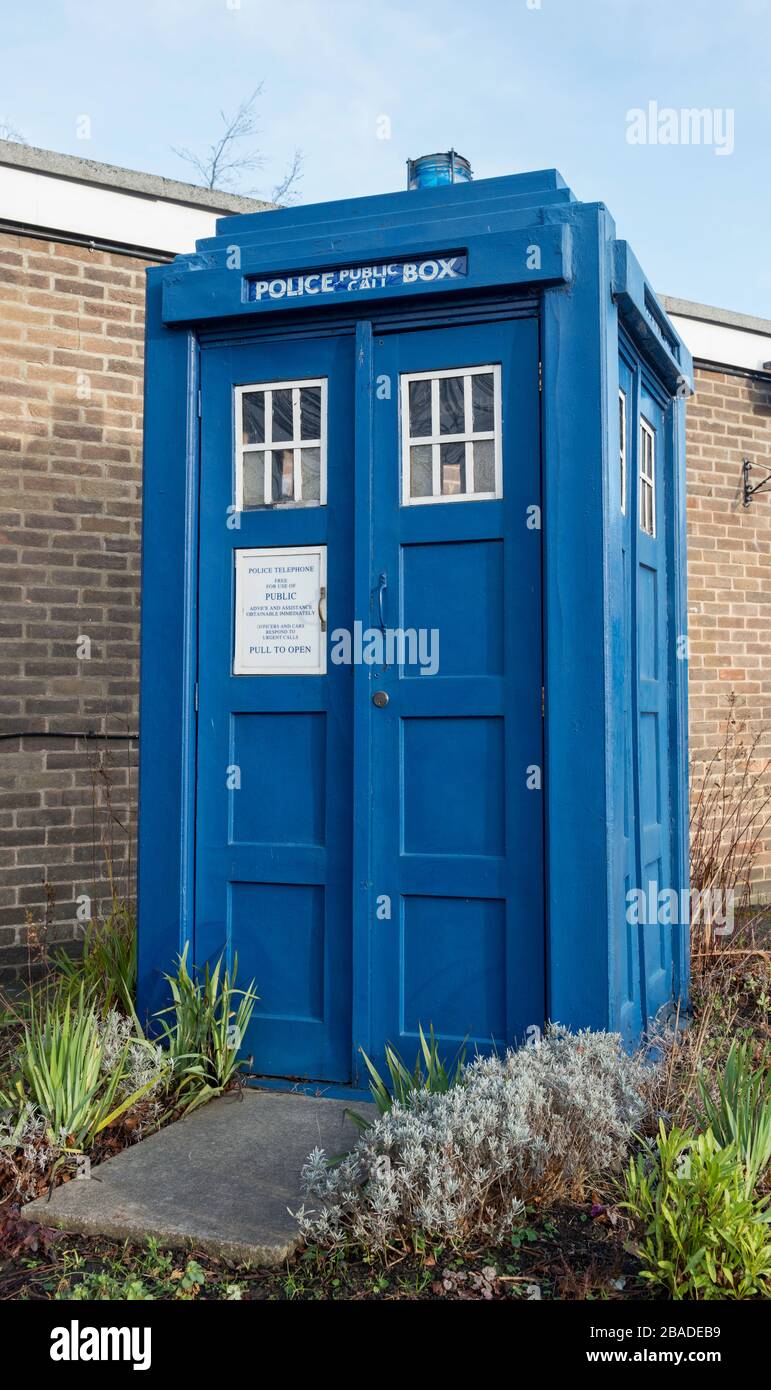 An old blue painted police call box in the grounds of the police station in Wetherby, West Yorkshire Stock Photo