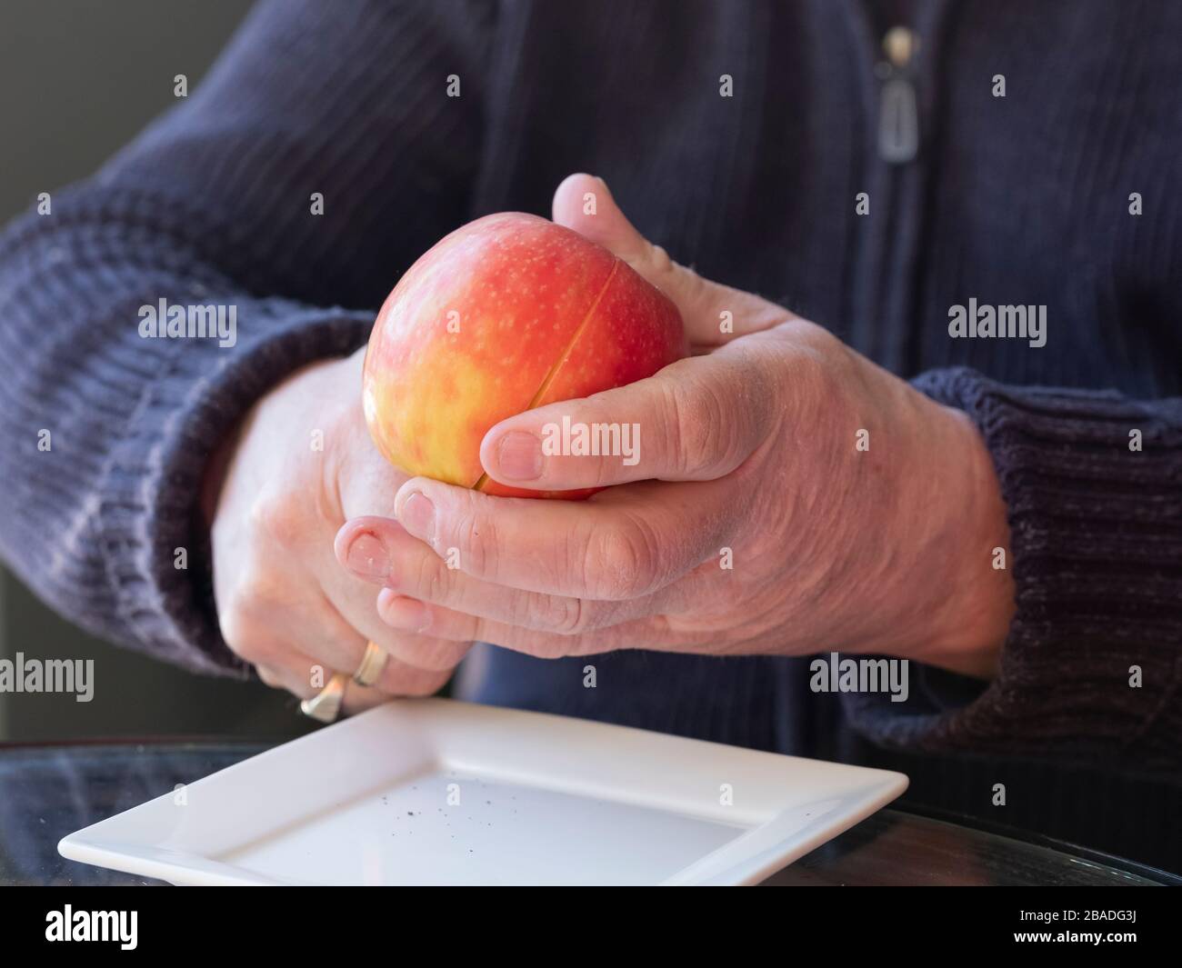 Male peeling apple hi-res stock photography and images - Alamy