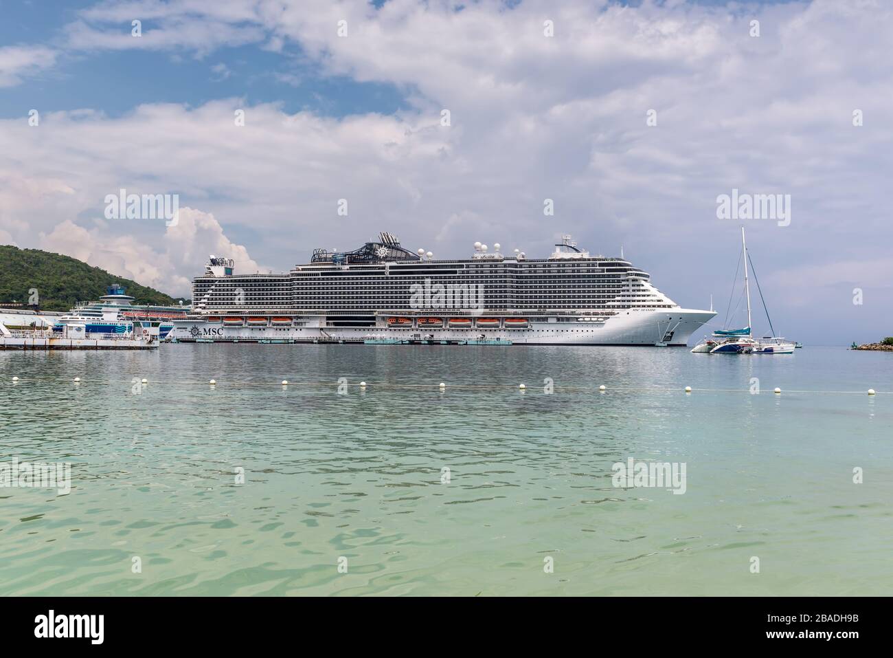 Ocho Rios, Jamaica - April 22, 2019: Cruise Ship MSC Seaside docked in the tropical Caribbean island of Ocho Rios, Jamaica. View from Ocho Rios Bay Be Stock Photo