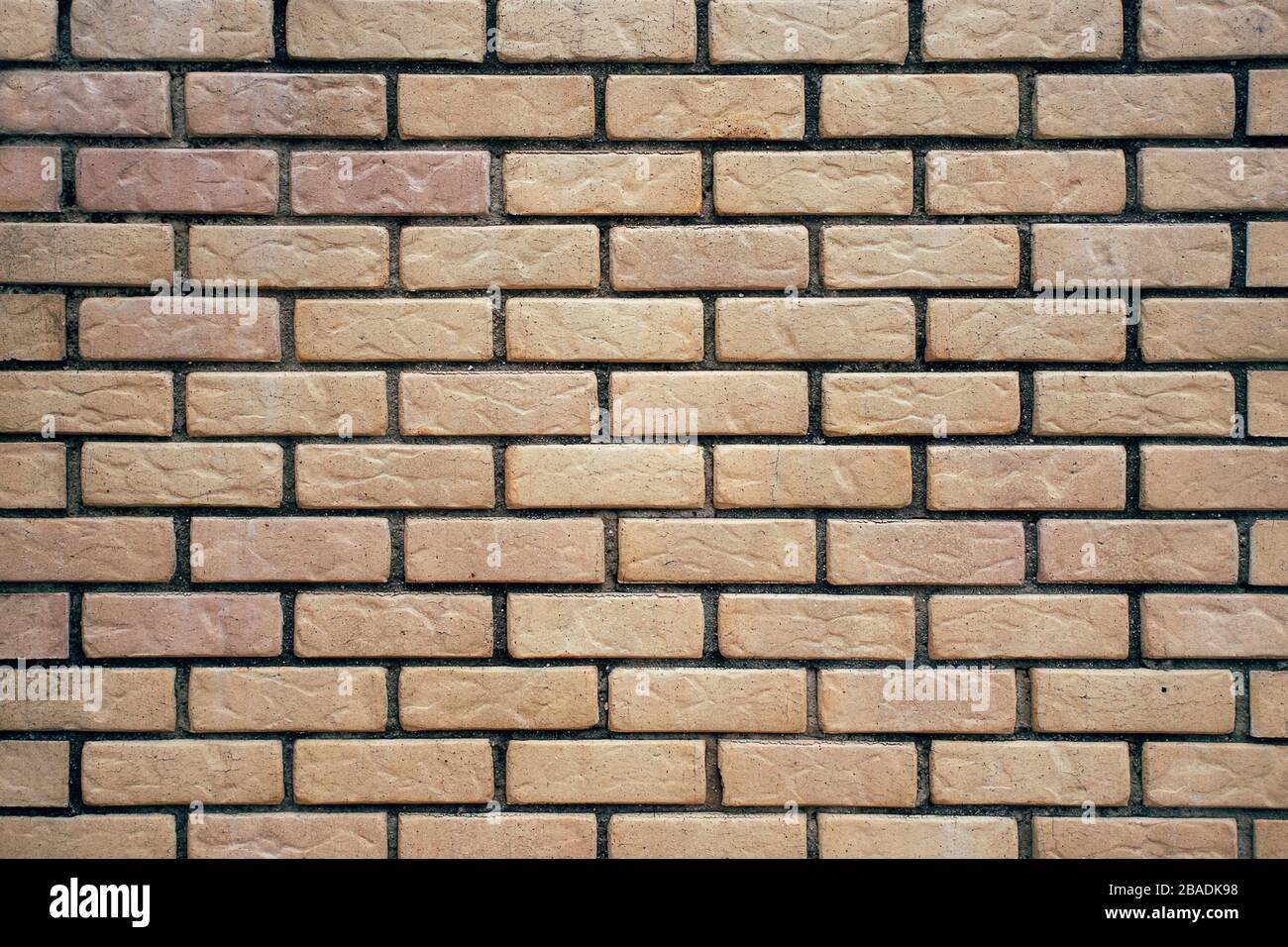 Background of light decorative brick wall texture. Stock Photo