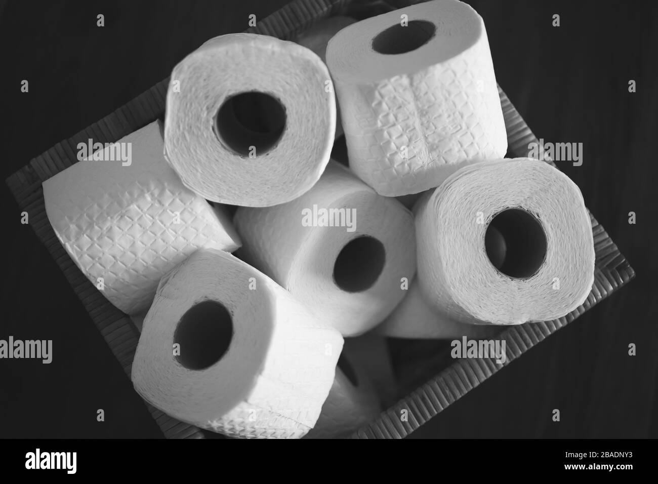 several toilet paper rolls in a box, black and white Stock Photo Alamy