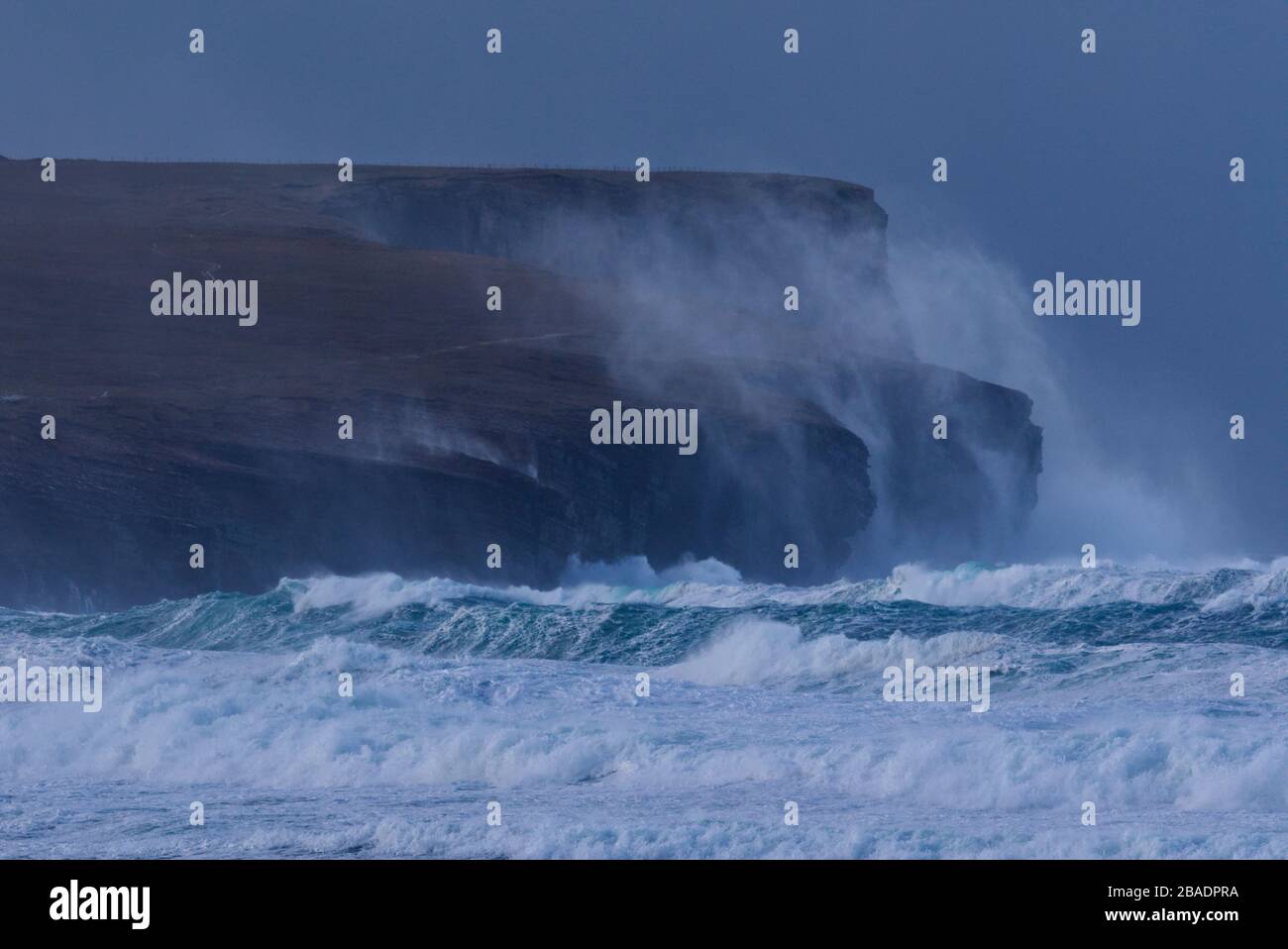 Rough seas and sea spray at Marwick Head, Orkney Isles Stock Photo