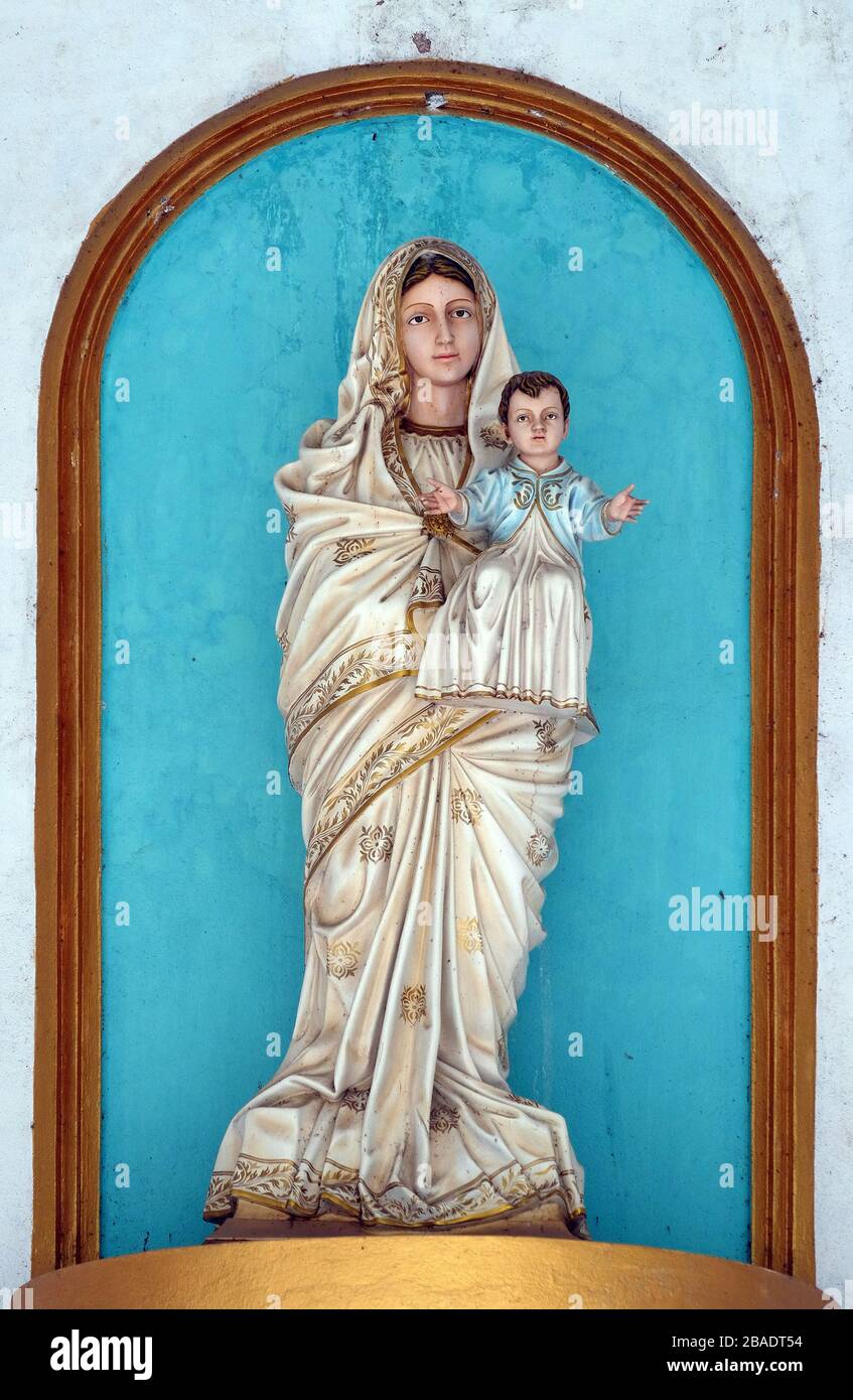 Virgin Mary with baby Jesus, statue on the portal of Our Lady of ...