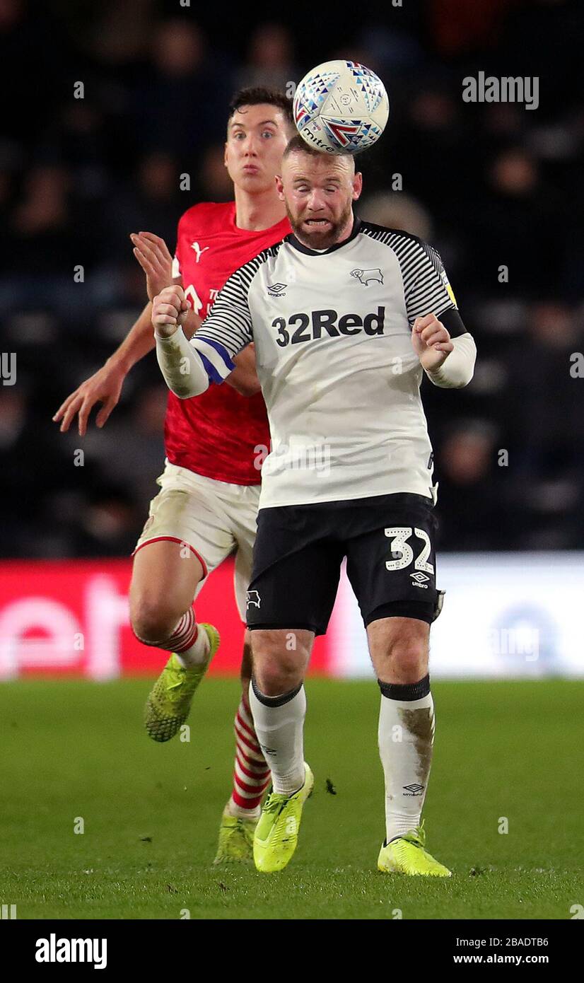 Derby County's Wayne Rooney headers the ball Stock Photo
