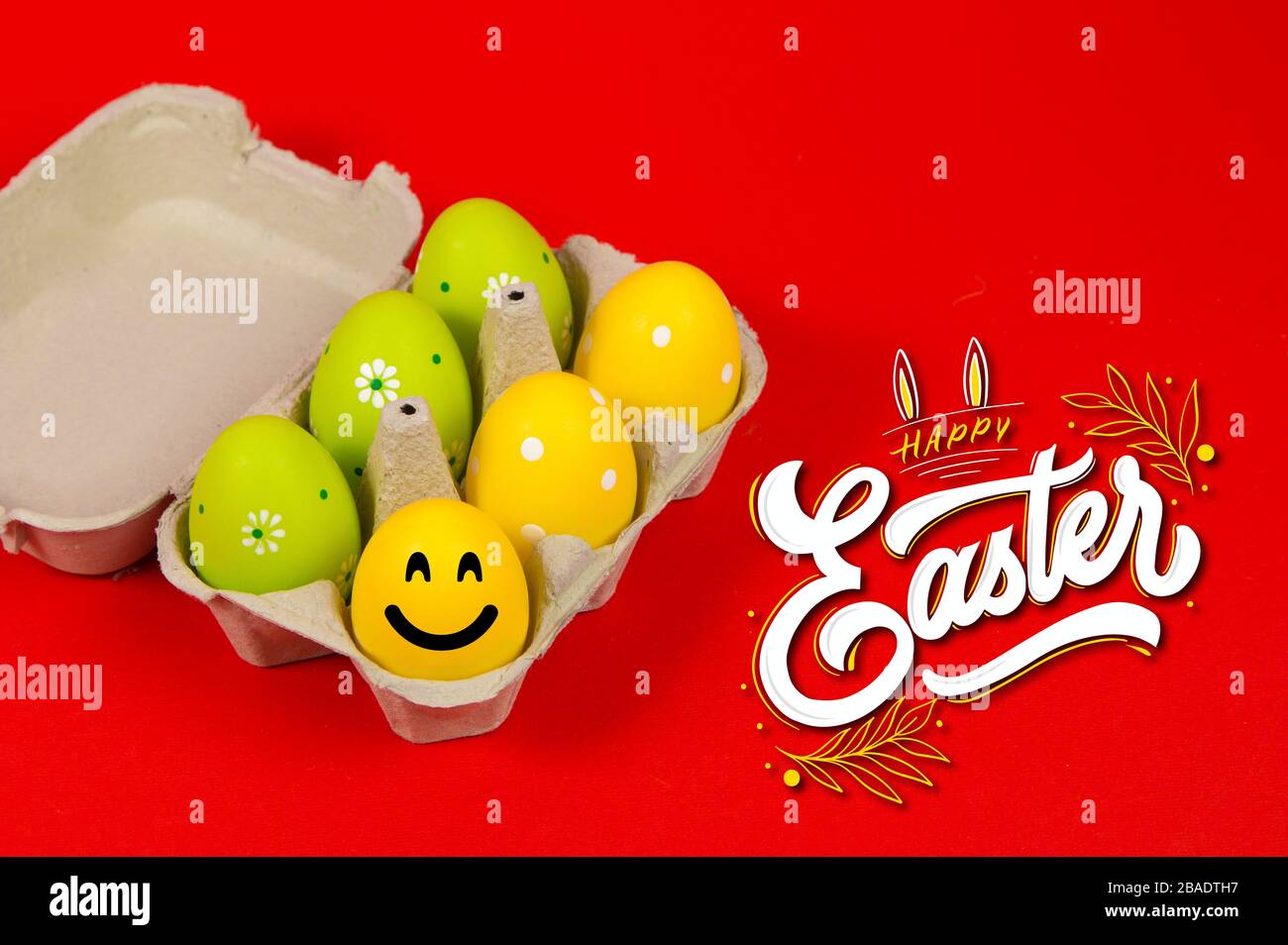 Colorful Easter eggs in a group on a red background Stock Photo
