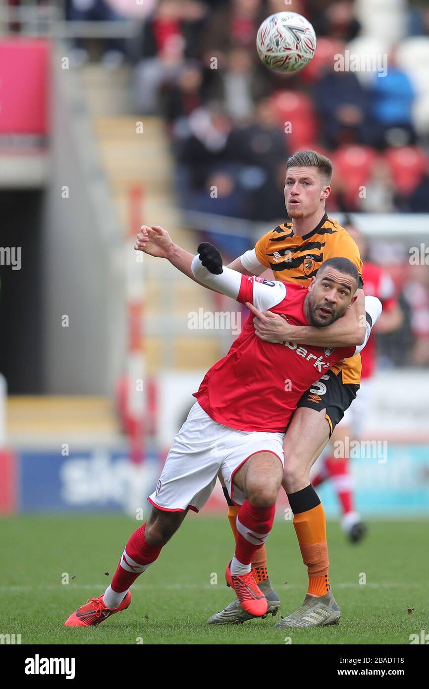 Rotherham United's Kyle Vassell (front) and Hull City's Reece Burke ...