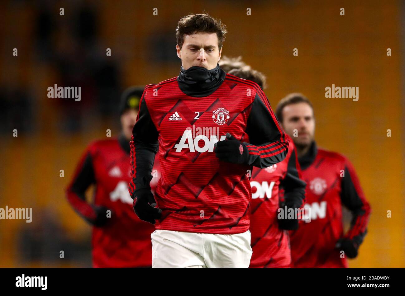 Manchester United's Victor Lindelof warms up ahead of the match Stock Photo