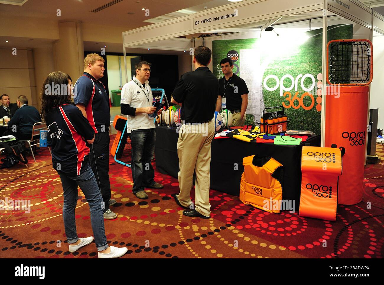 Delegates mingle around the exhibitions in the exhibition hall Stock Photo