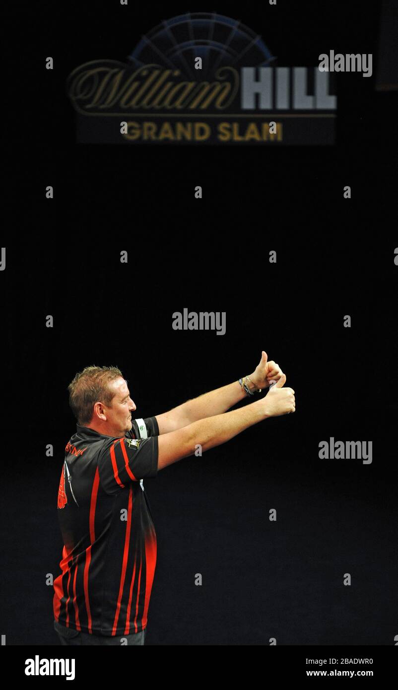 Dean Winstanley takes the applause after his victory overSimon Whitlock. Stock Photo