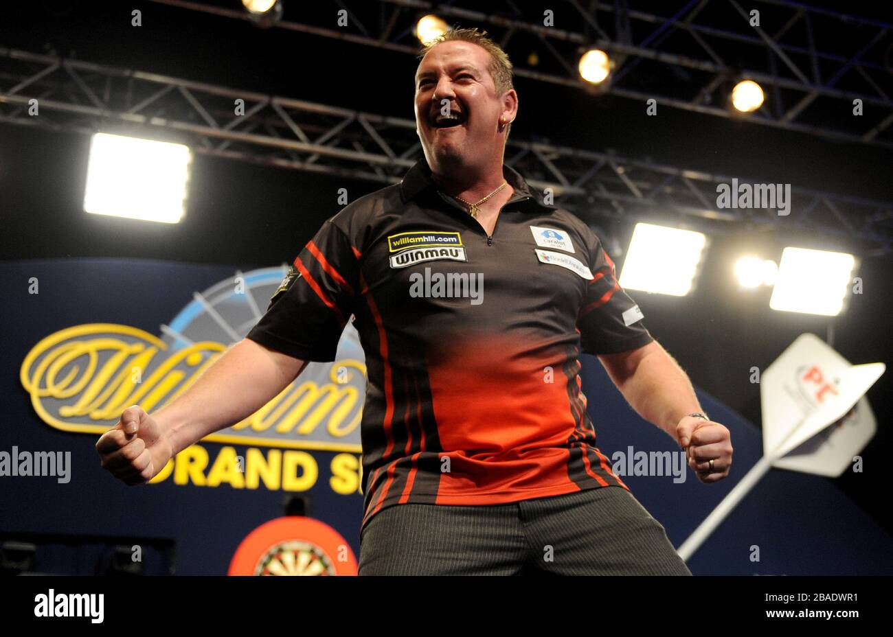 Dean Winstanley celebrates his victory over Simon Whitlock. Stock Photo