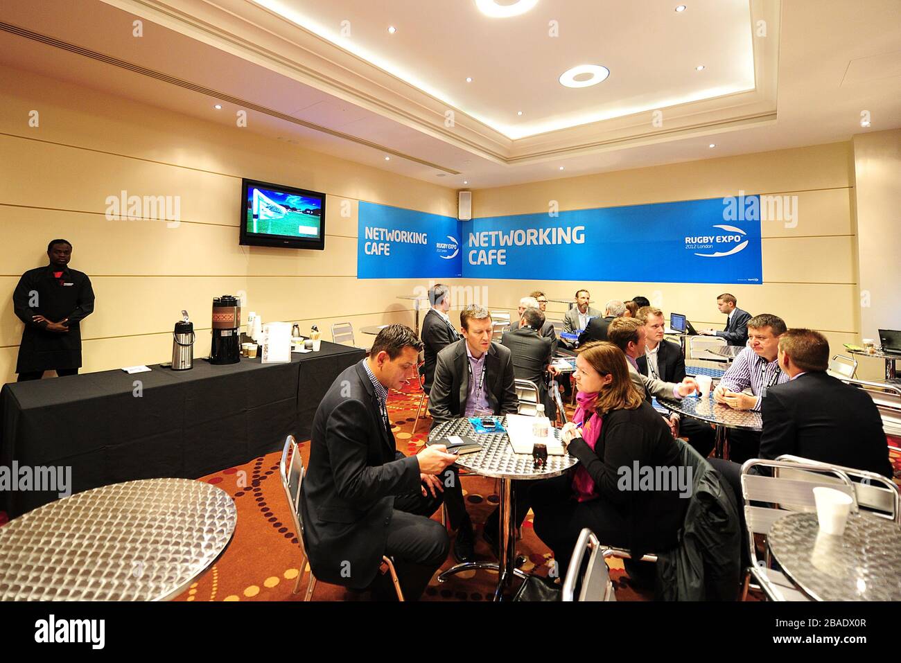 General view of delegates mingling in the Networking Cafe on Day One of the Rugby Expo 2012 Stock Photo