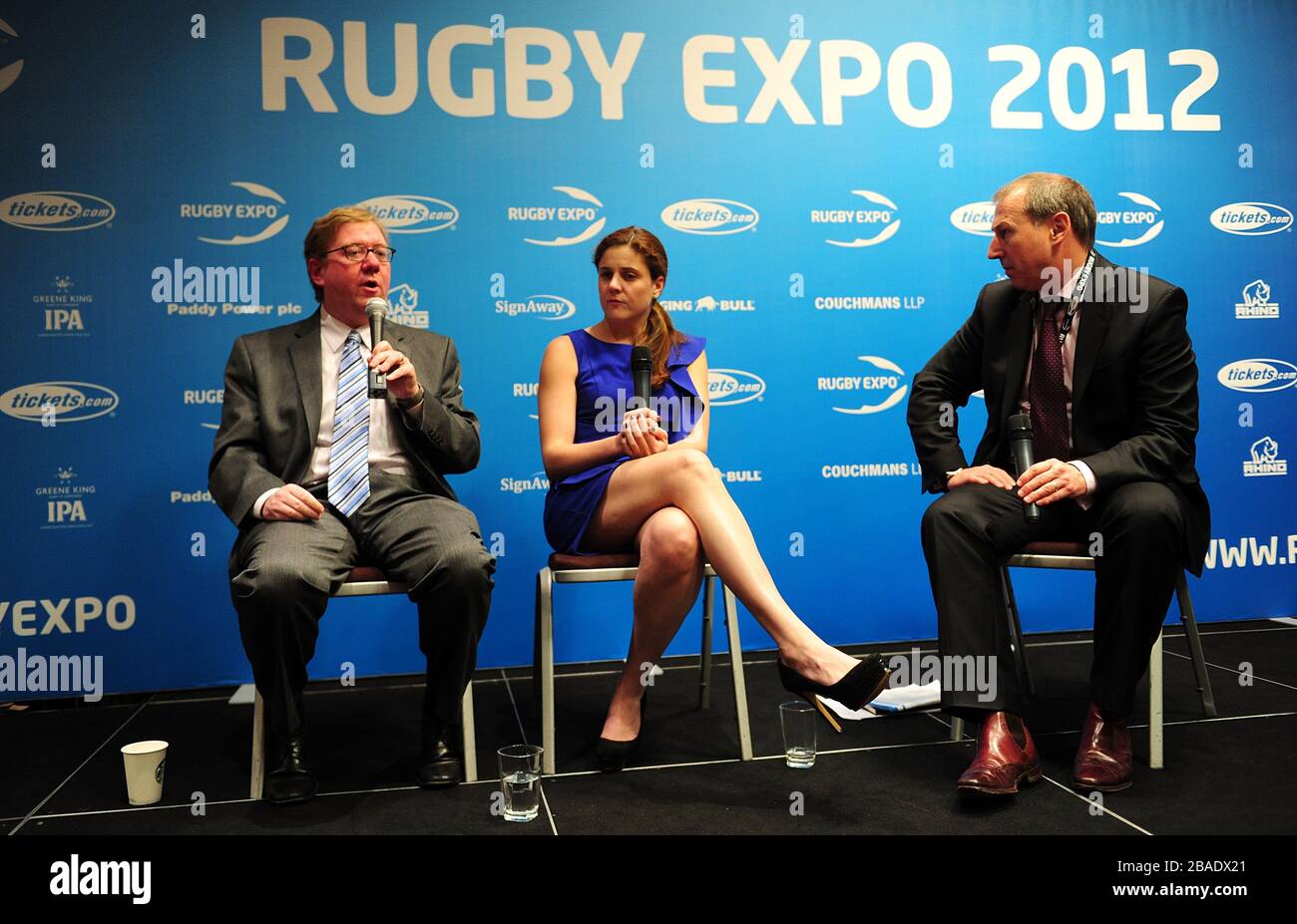 Managing Director of International Business at Tickets.com Derek Palmer (left) and Vice President of Ticket Sales & Services for the New York Mets Leigh Castergine (centre) speak with Kevin Roberts of Sport Business International (right) during Day One of the Rugby Expo 2012 Stock Photo