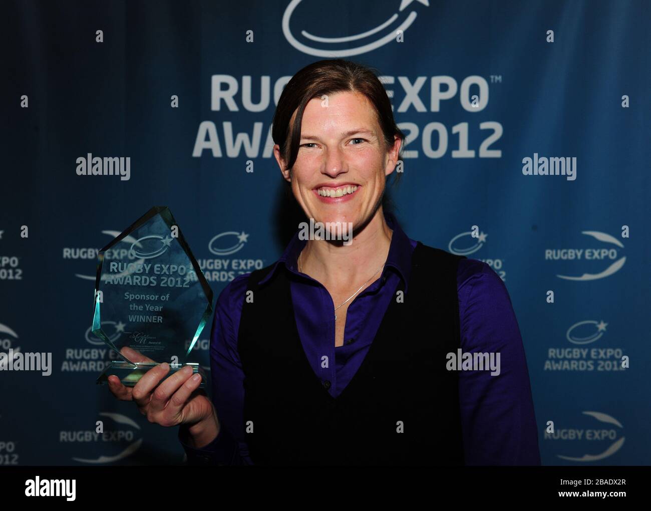 Louisa Cheetham holds the award for the Sponsor of the Year during The 2012 Rugby Expo Awards and Dinner in the LIVE Room, Twickenham. Stock Photo