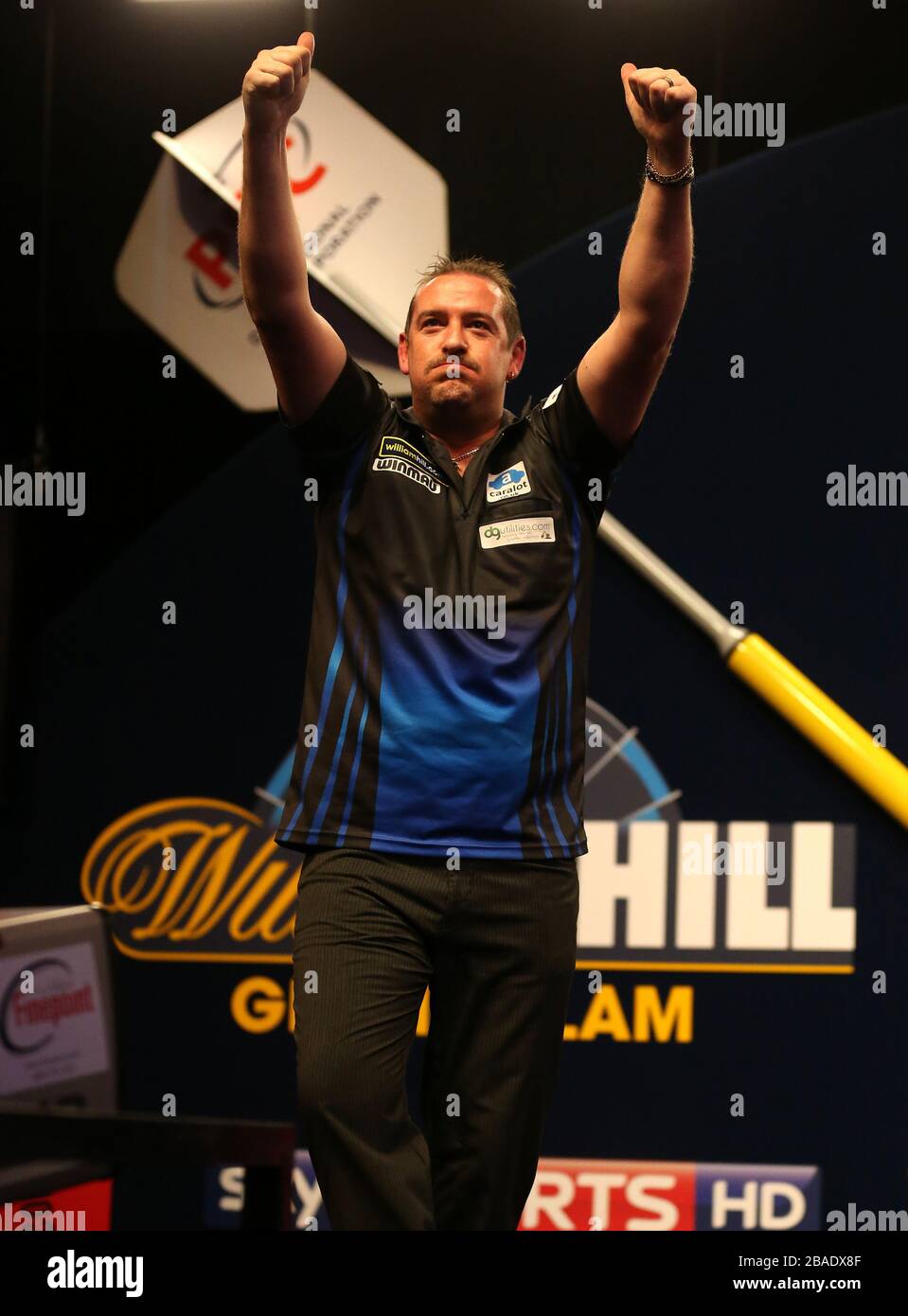 Dean Winstanley celebrates victory is his second round match against Arron Monk Stock Photo