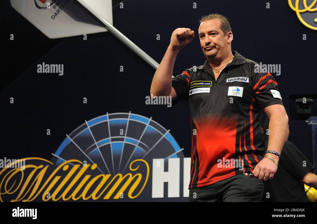 Dean Winstanley celebrates after his quarter final victory over Kevin Painter Stock Photo