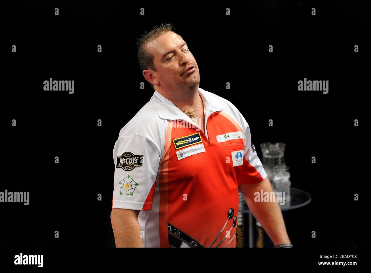 Dean Winstanley reacts during his semi final against Michael van Gerwen Stock Photo