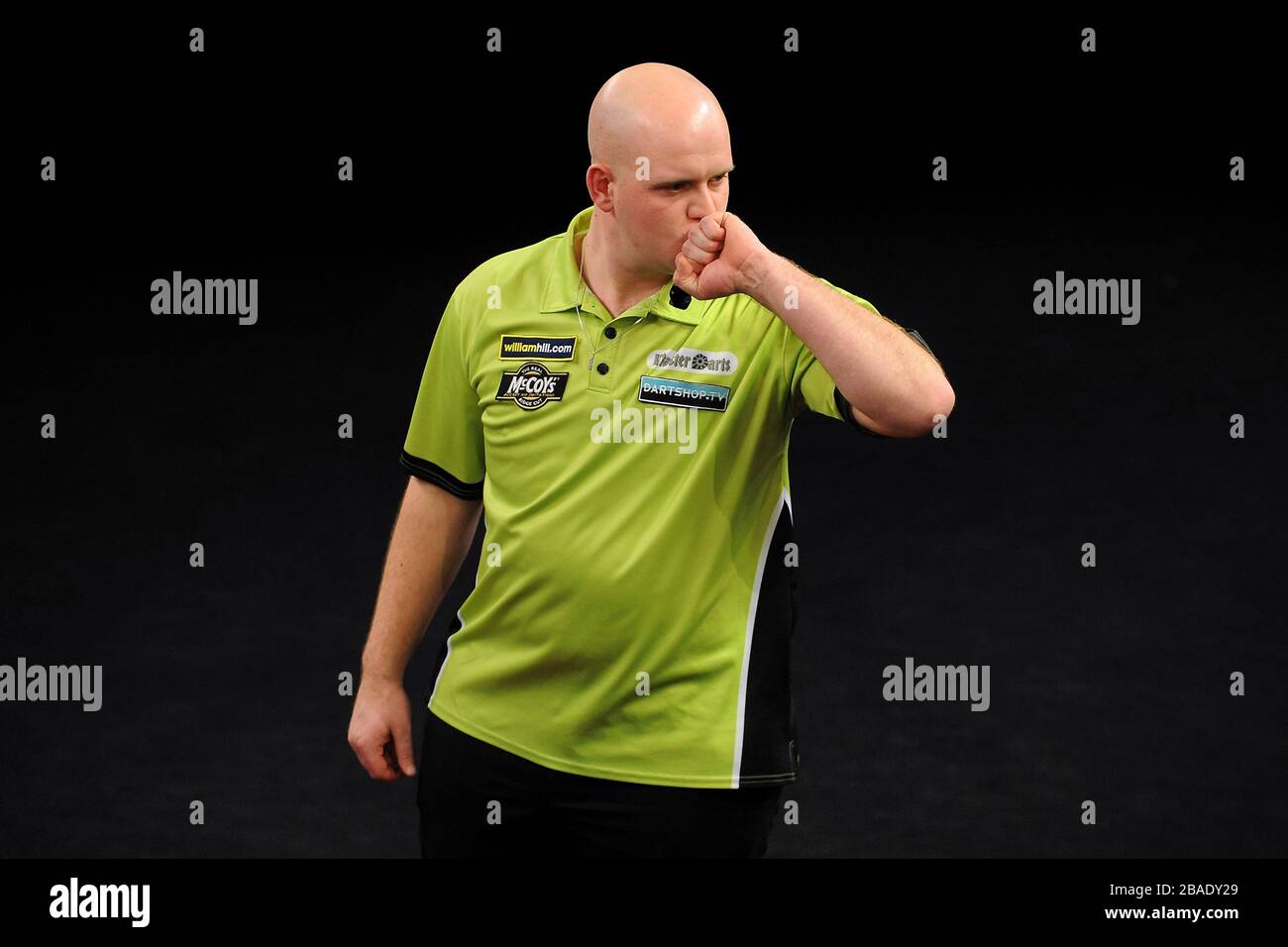 Michael van Gerwen celebrates beating Dean Winstanley to reach the final of the Grand Slam of Darts Stock Photo