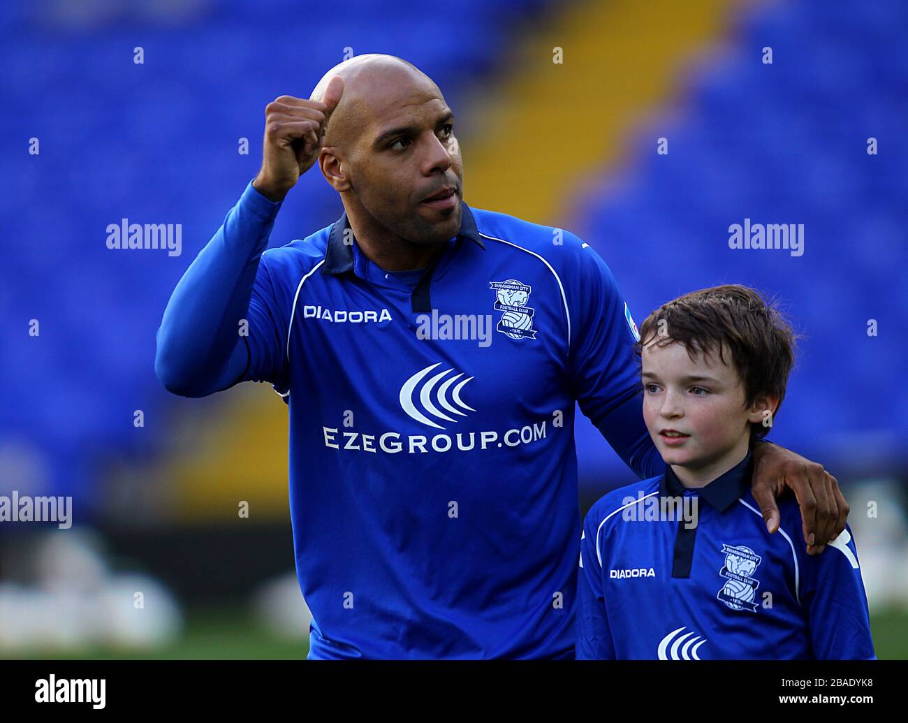 Birmingham City's Marlon King (left) with a mascot before kickoff