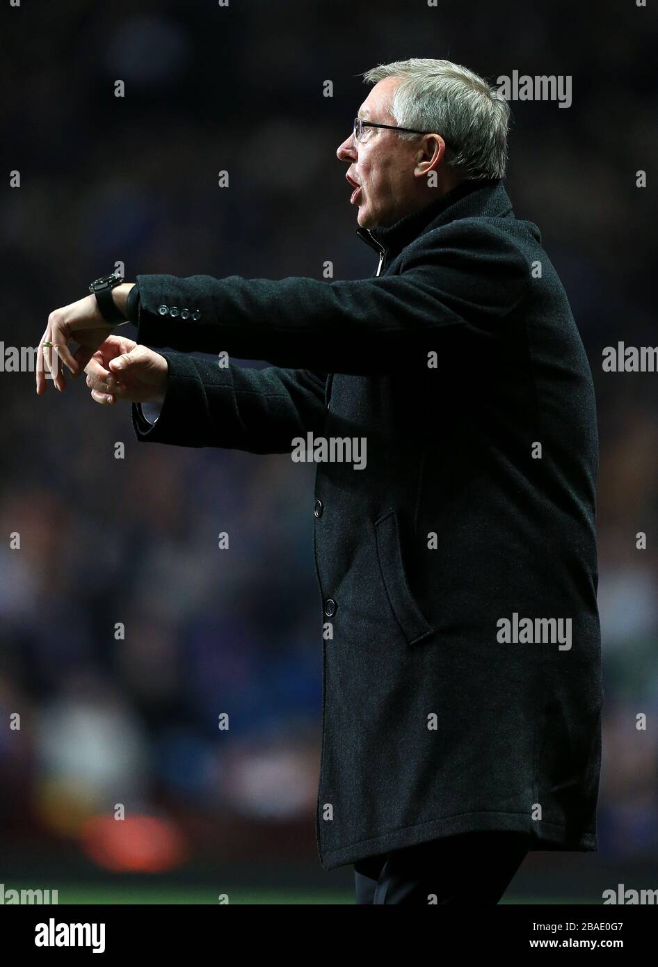 Manchester United Manager Sir Alex Ferguson Points To His Watch Stock Photo Alamy